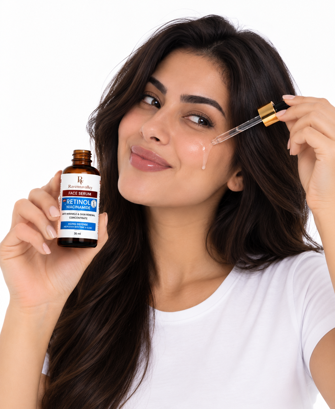 Woman applying Ravenna Valley Face Serum Retinol & Niacinamide to her cheek with a dropper
